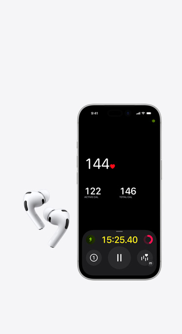 Trådlösa hörlurar, vänster och höger öronsnäcka intill en iPhone som visar pulsmätning på skärmen