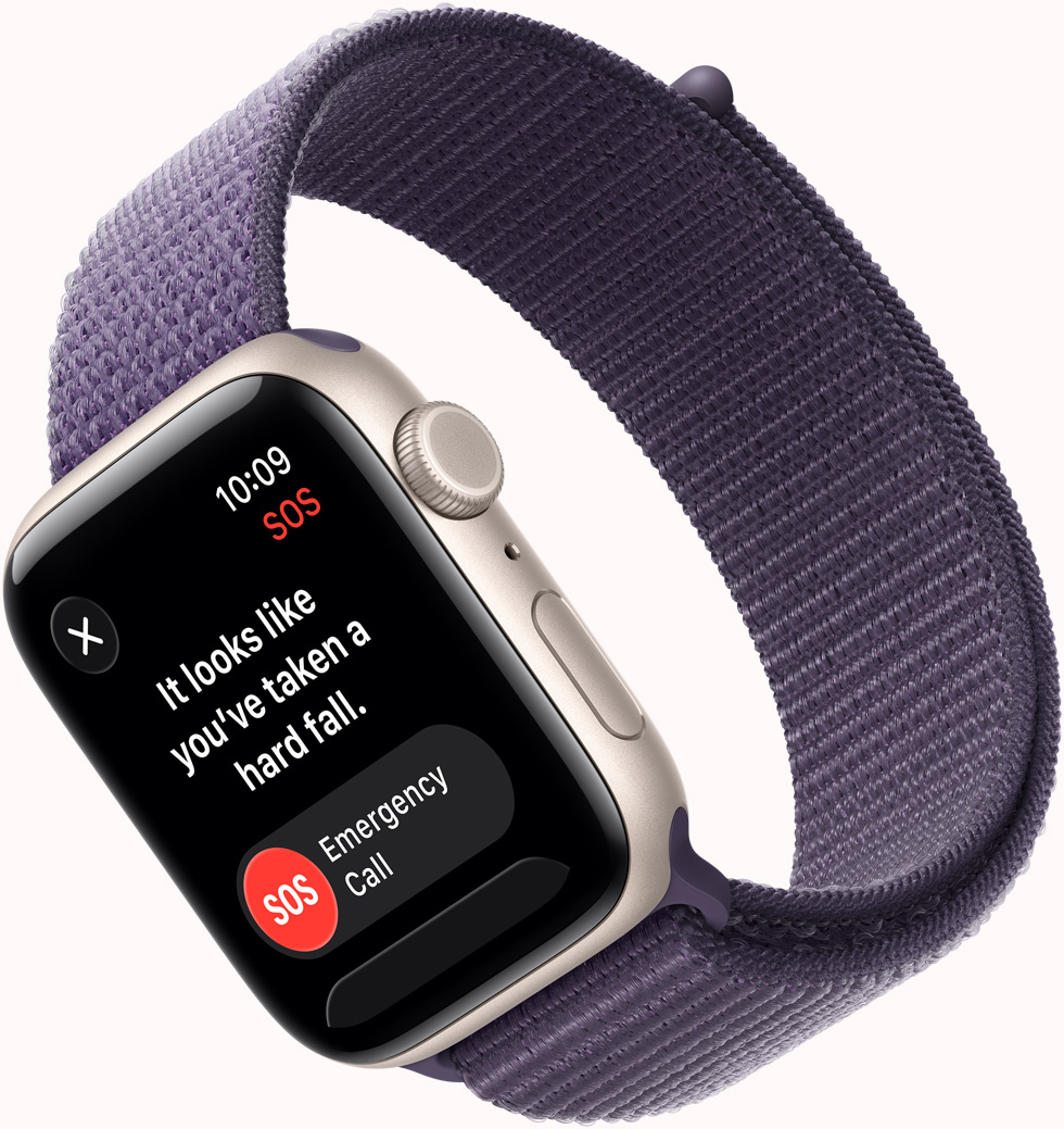 Apple Watch SE 3, aluminiumboett i färgen stjärnglans, SOS-notis från Falldetektering, knapparna Nödanrop och Jag mår bra, höger utsida, Digital Crown, mikrofon, sidoknapp, sportloop i färgen purpurdimma