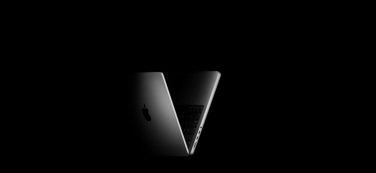 En MacBook Pro som står som ett V, som en hint till serien med M5-chip